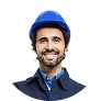 Smiling man wearing a blue hard hat and a dark jacket, shown from the shoulders up against a plain background.
